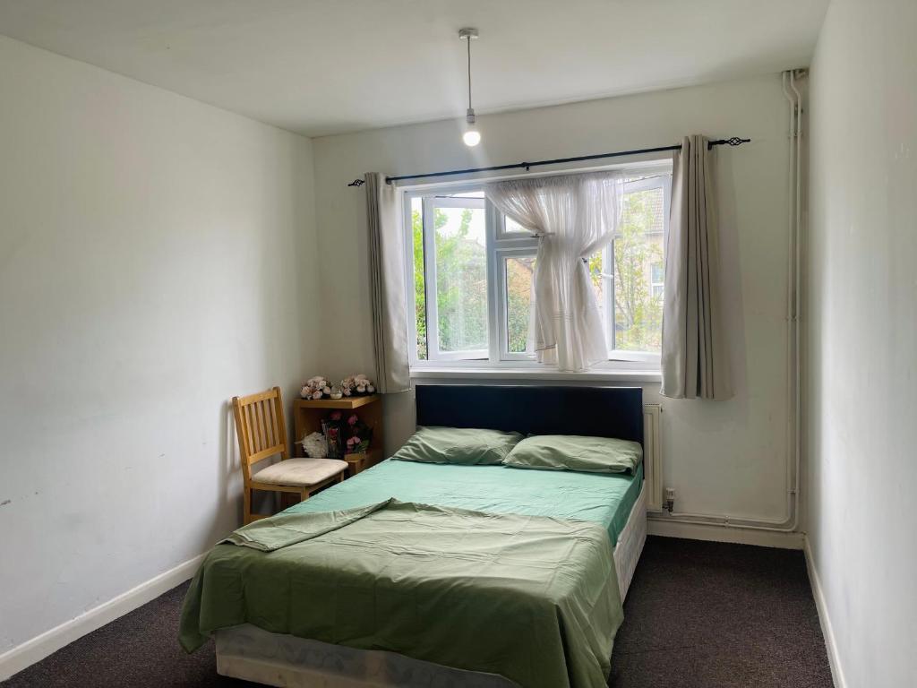 Postel nebo postele na pokoji v ubytování Ilford rooms