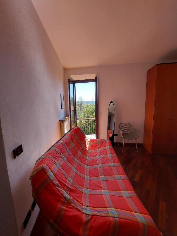 Postel nebo postele na pokoji v ubytování La Casa di Anna