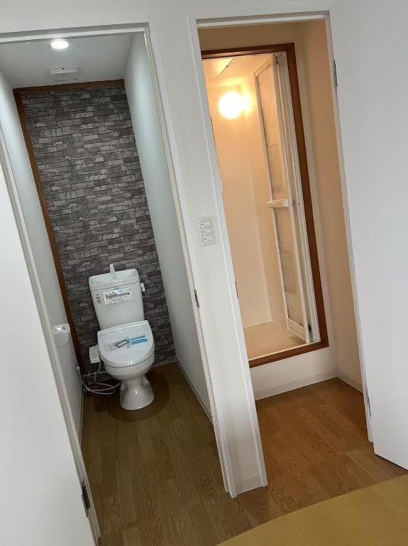 Ett badrum på Nippori Osaka Nishi-Tengachaya Guesthouse西天下茶屋アパートメント