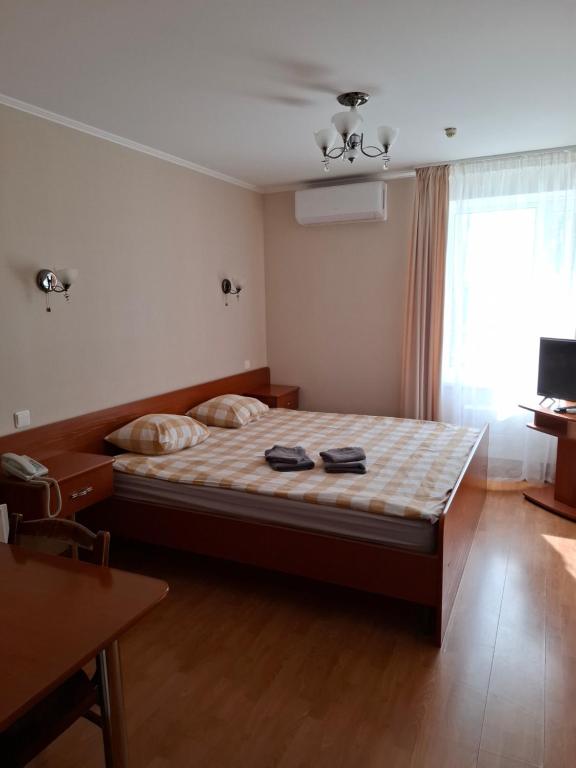 Postel nebo postele na pokoji v ubytování Duets