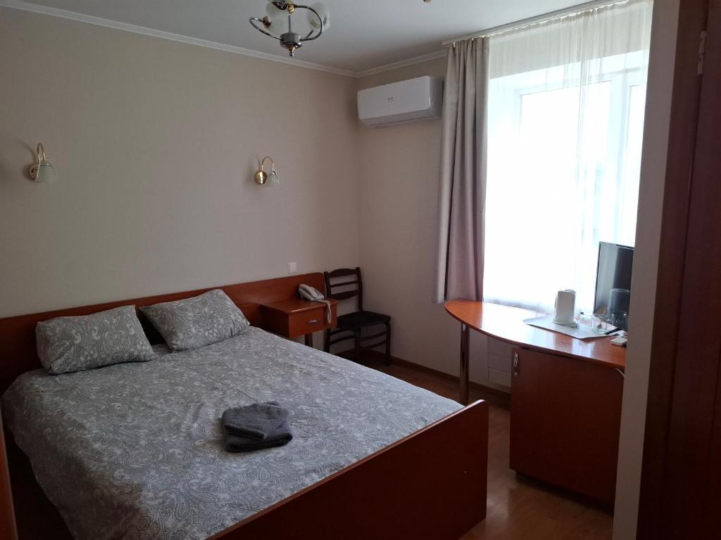 Postel nebo postele na pokoji v ubytování Duets