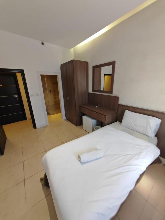 Postel nebo postele na pokoji v ubytování New Metropole Hotel - Jerusalem
