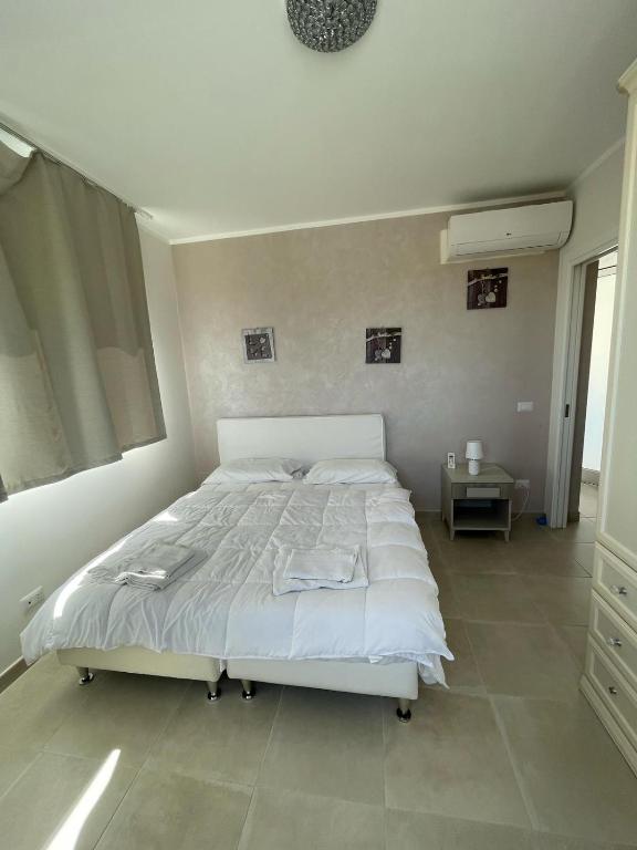 Postel nebo postele na pokoji v ubytování B&B Villa Eraclea