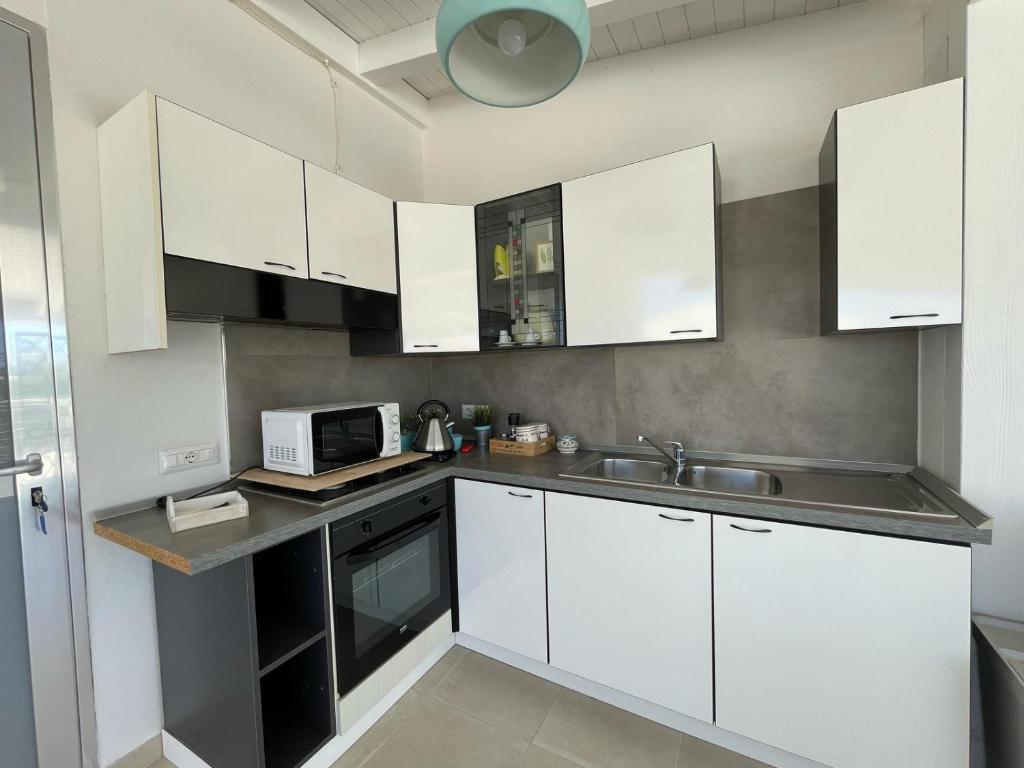 Kuchyň nebo kuchyňský kout v ubytování B&B Villa Eraclea