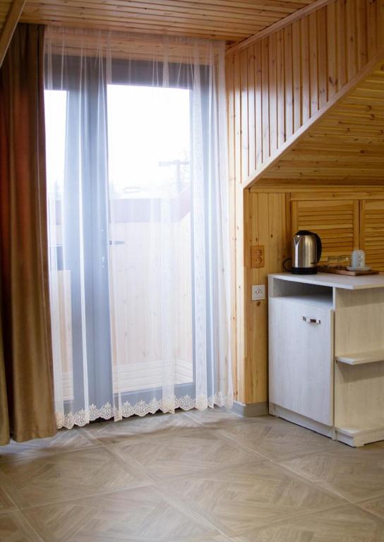 Kuchyň nebo kuchyňský kout v ubytování Chief Hotel