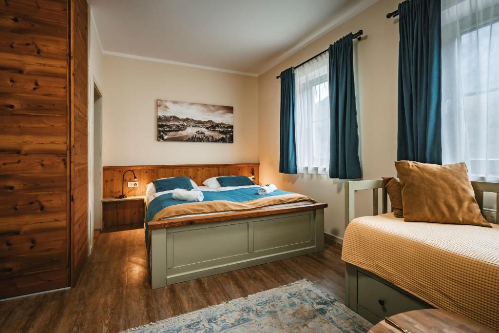 Postel nebo postele na pokoji v ubytování Guest House EJGA