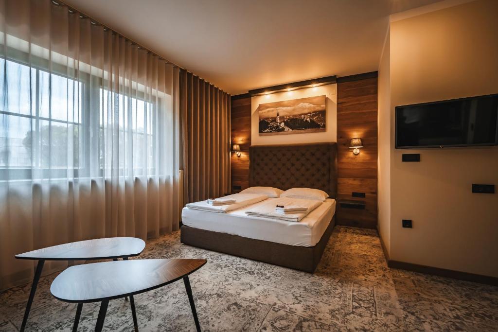 Postel nebo postele na pokoji v ubytování Guest House EJGA