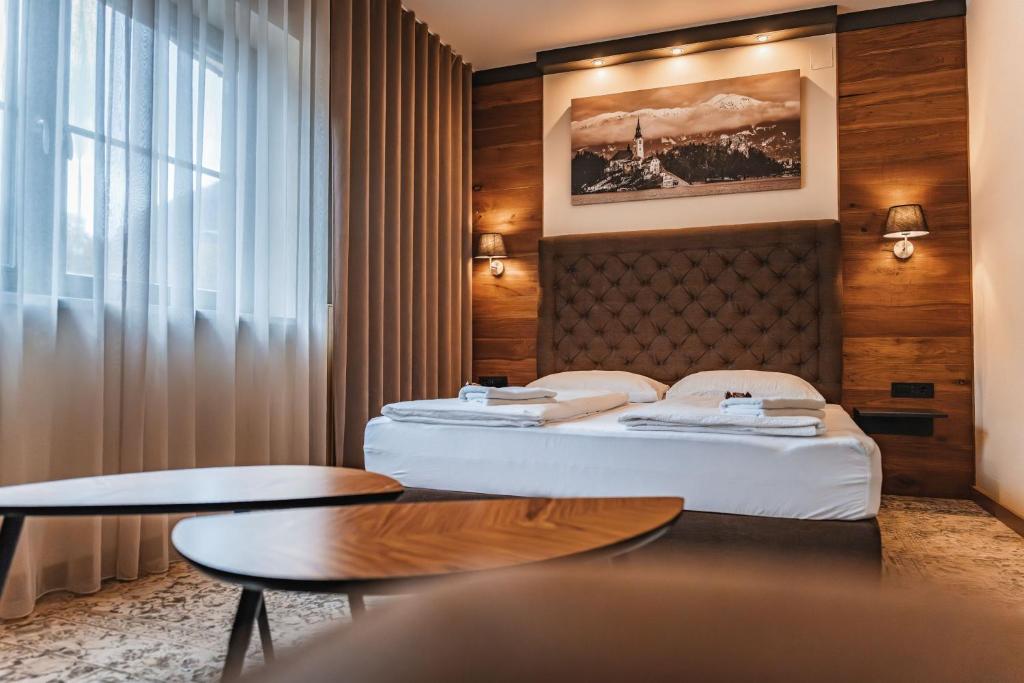Postel nebo postele na pokoji v ubytování Guest House EJGA