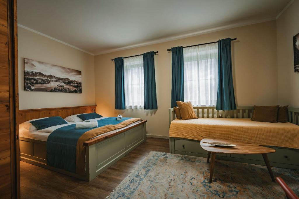 Postel nebo postele na pokoji v ubytování Guest House EJGA