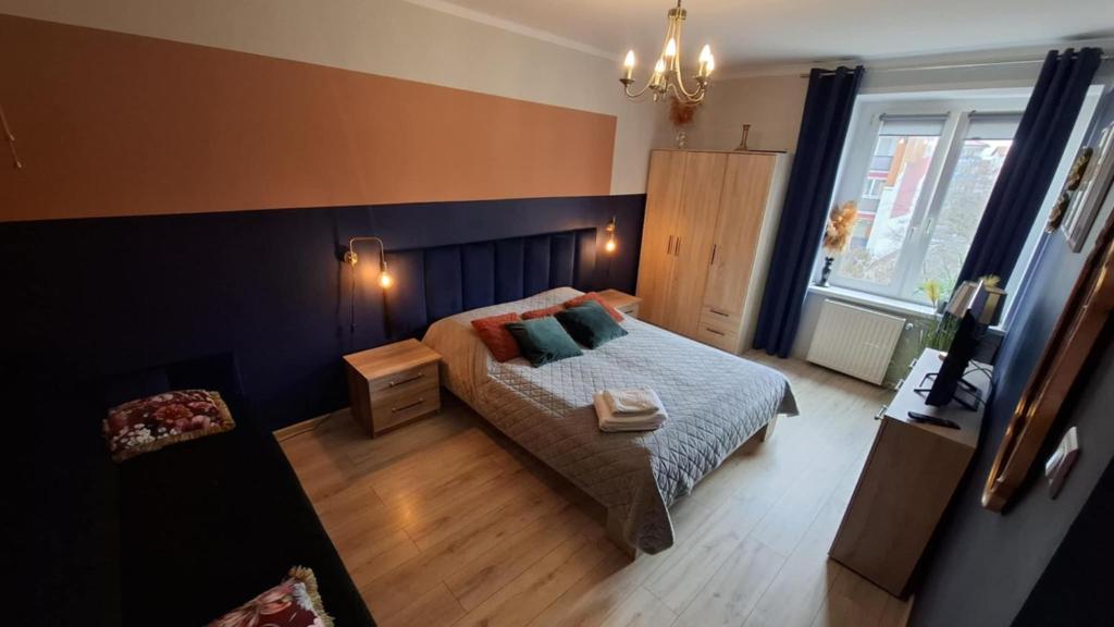 Posteľ alebo postele v izbe v ubytovaní Lake Room Ełk