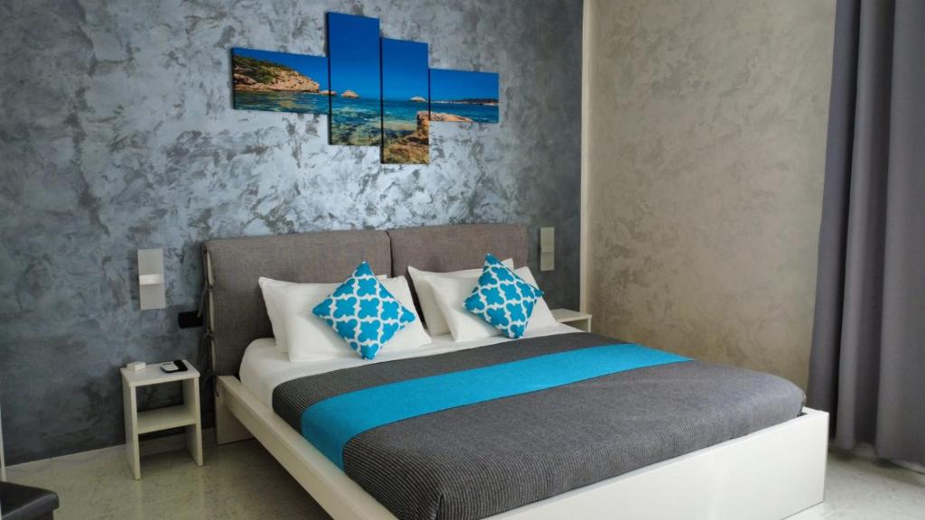 Postel nebo postele na pokoji v ubytování B&B La Munachell