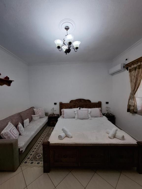 Postel nebo postele na pokoji v ubytování Guest House Luna
