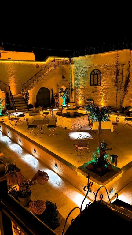 an aerial view of a building with a stage at Liora Hotel in Urfa