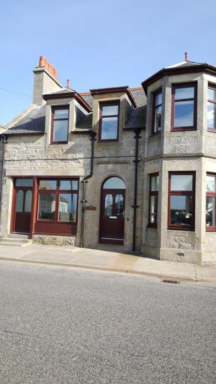 a house on the side of a city street at Tighnabruaich Annex in Lossiemouth