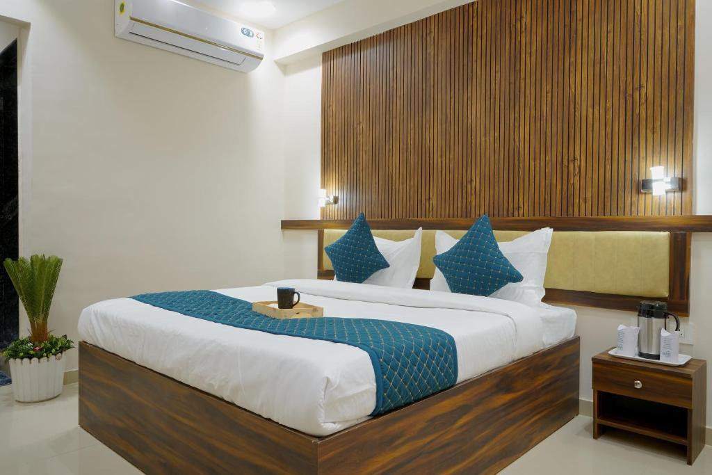 Postel nebo postele na pokoji v ubytování Hotel Elite inn