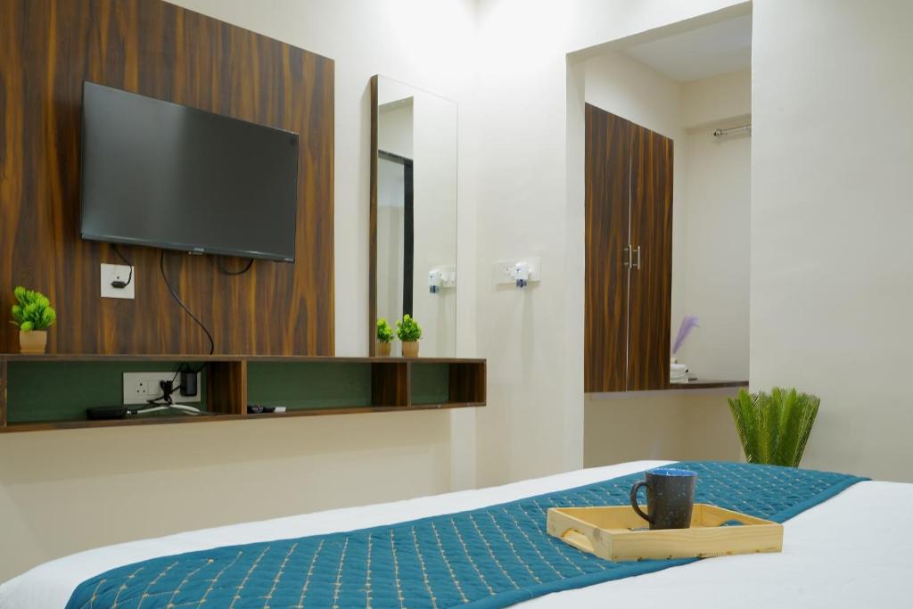 Postel nebo postele na pokoji v ubytování Hotel Elite inn