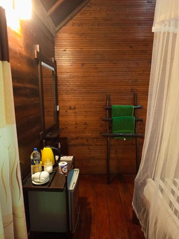 Postel nebo postele na pokoji v ubytování Eco Village