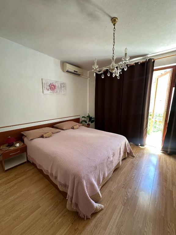 Posteľ alebo postele v izbe v ubytovaní Apartment House Aria