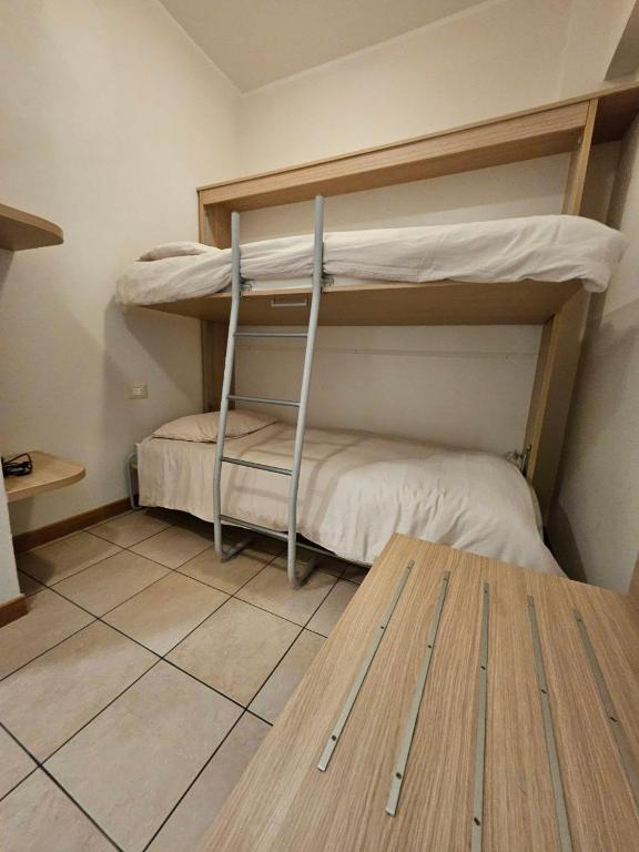 Postel nebo postele na pokoji v ubytování Albergo Nyers