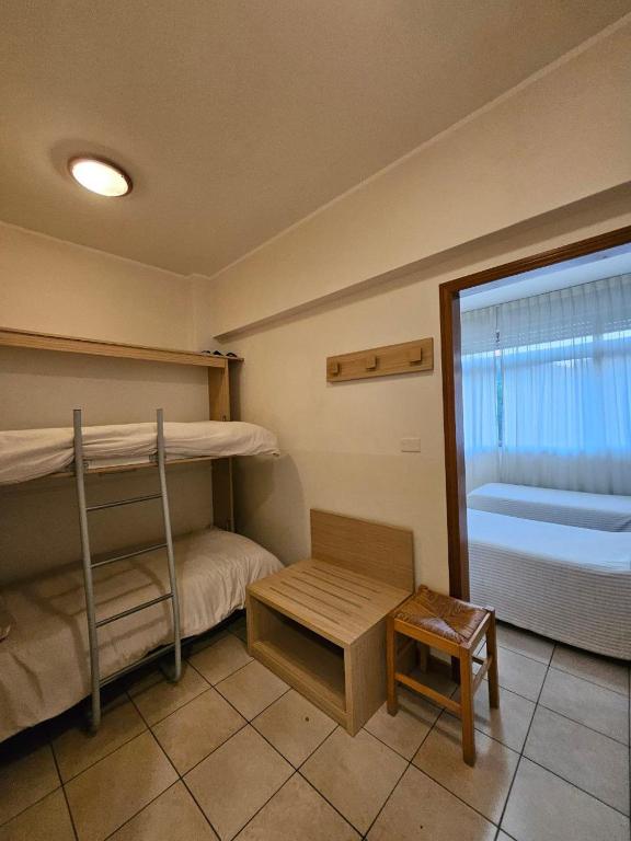 Postel nebo postele na pokoji v ubytování Albergo Nyers