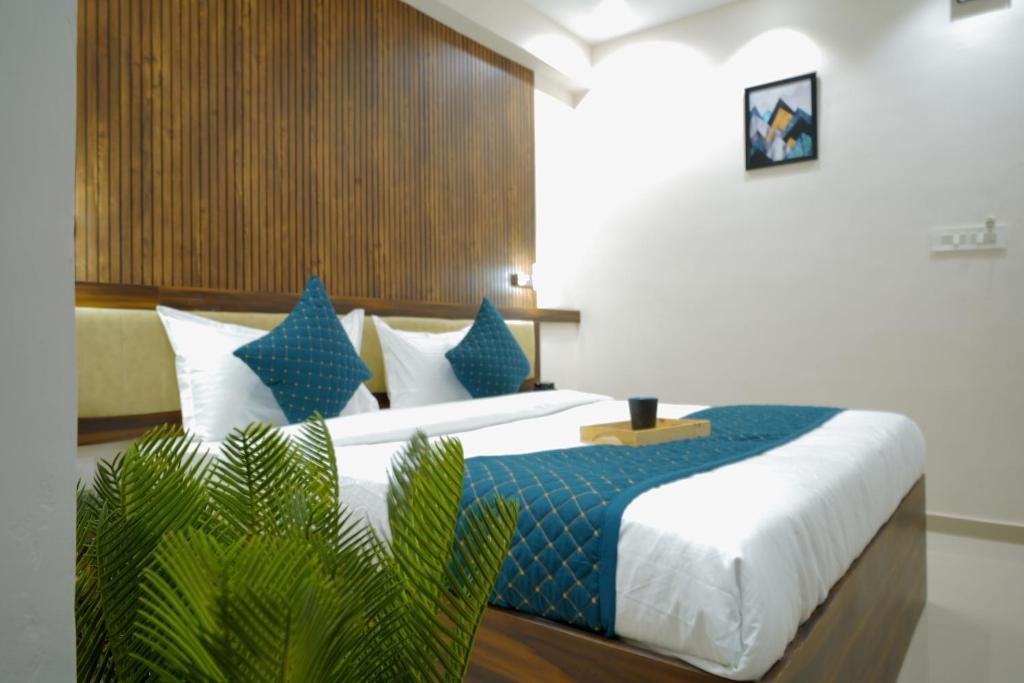 Postel nebo postele na pokoji v ubytování Hotel Elite inn