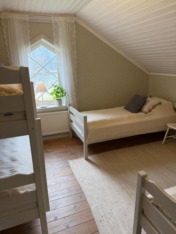 Postel nebo postele na pokoji v ubytování Notholmen, Tyresö