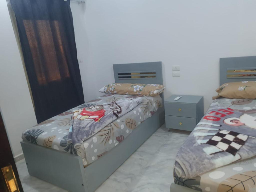 Postel nebo postele na pokoji v ubytování ALDINO house