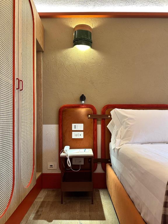 Postel nebo postele na pokoji v ubytování L'orto Delle Terme