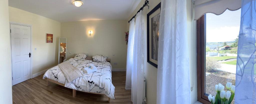 Postel nebo postele na pokoji v ubytování Lake View Doubleroom en Suite