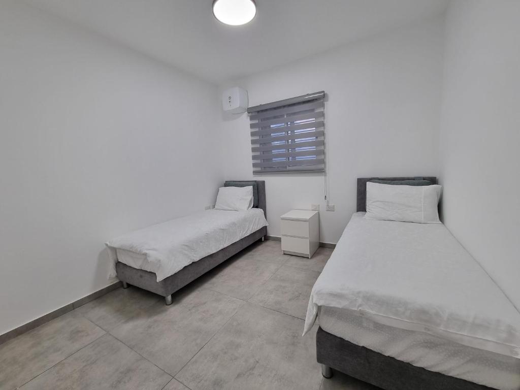 Postel nebo postele na pokoji v ubytování Albi Boutique Apartments