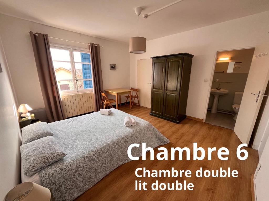 Postel nebo postele na pokoji v ubytování U pozzu hôtel