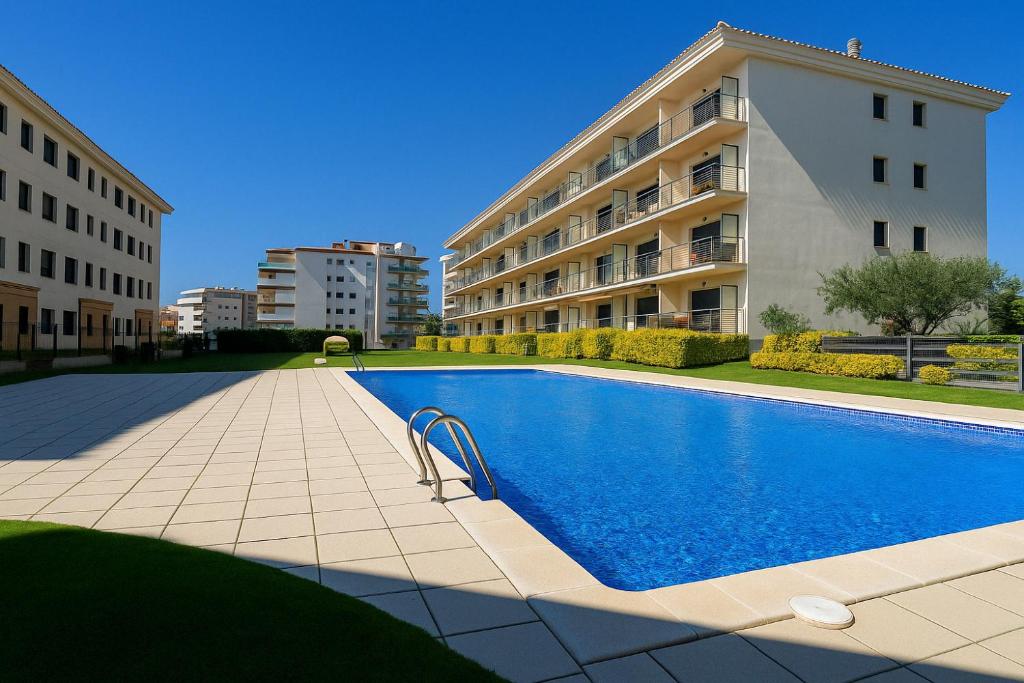 Bazén v ubytovaní Roses Confort Beach EV Milleni alebo v jeho blízkosti