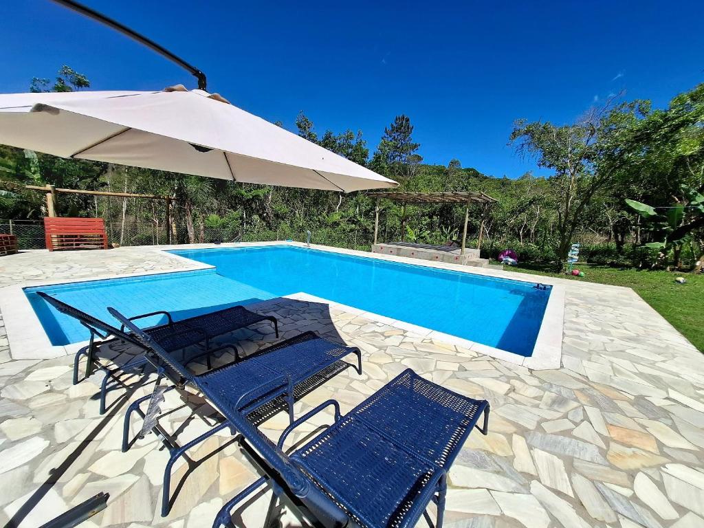Gambar di galeri bagi Chácara aconchegante com piscina e lazer LT0061 di Juquitiba