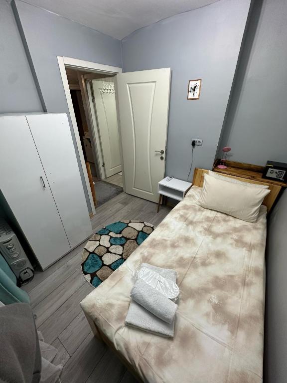Postel nebo postele na pokoji v ubytování Nelly Guesthouse