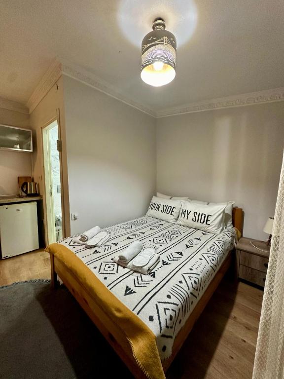 Postel nebo postele na pokoji v ubytování Nelly Guesthouse