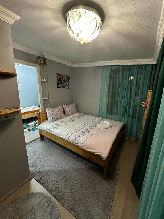 Postel nebo postele na pokoji v ubytování Nelly Guesthouse