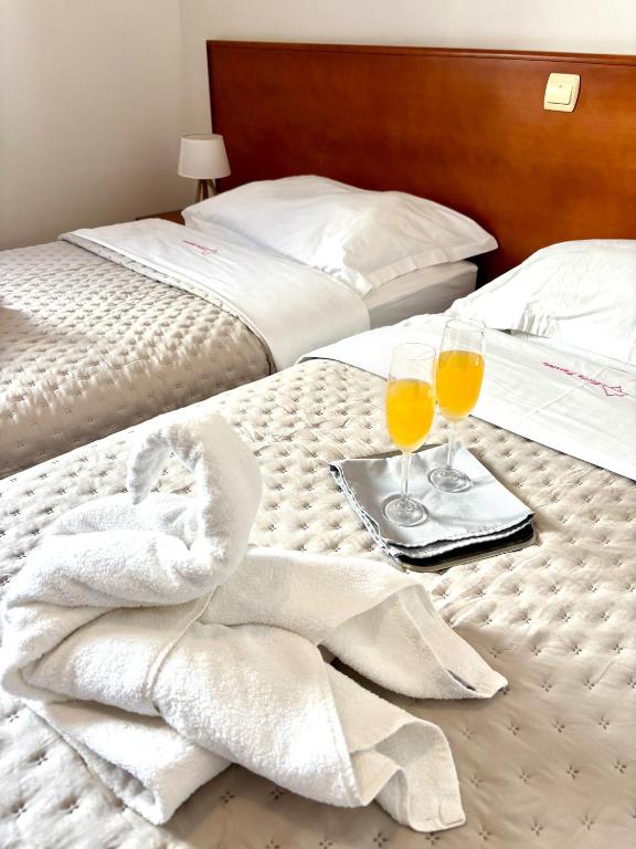 Postel nebo postele na pokoji v ubytování Villa Daniela