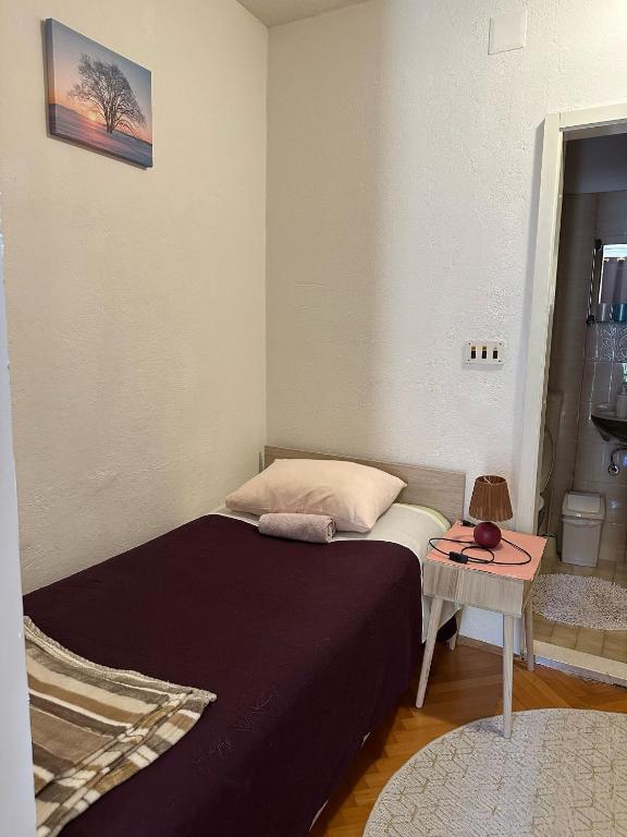 Posteľ alebo postele v izbe v ubytovaní Apartment House Aria