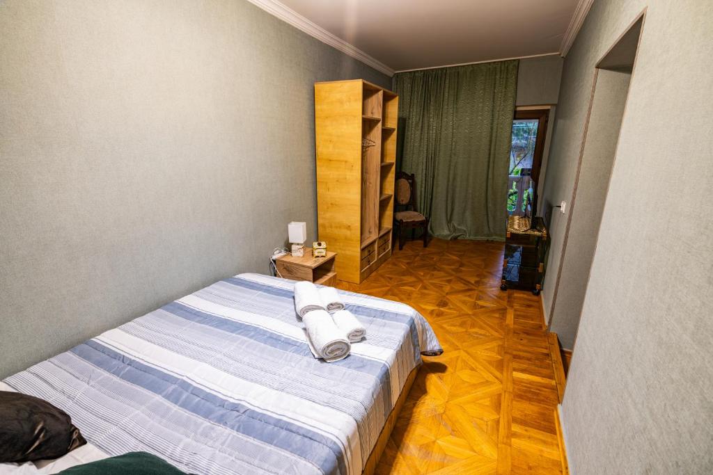 Postel nebo postele na pokoji v ubytování Hotel Elemtega Kutaisi