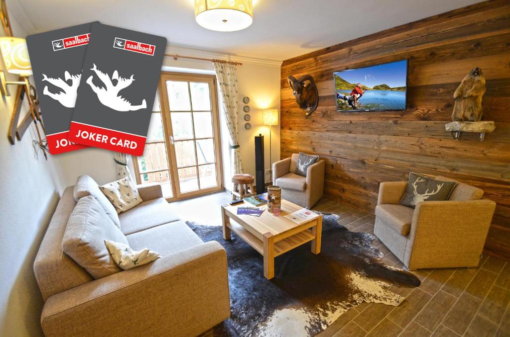 Televízia a/alebo spoločenská miestnosť v ubytovaní Appartementhaus Kristall incl Joker Card by All in One Apartments