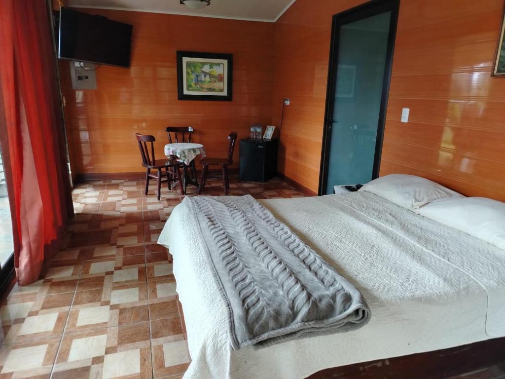 Postel nebo postele na pokoji v ubytování Suite y Loft Casa Toría