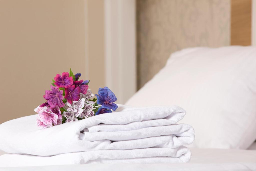 Postel nebo postele na pokoji v ubytování Hotel Luxe Stay Near Delhi Airport