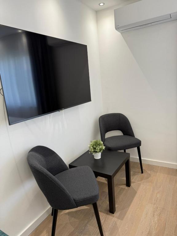 TV a/nebo společenská místnost v ubytování Apartmani Maira