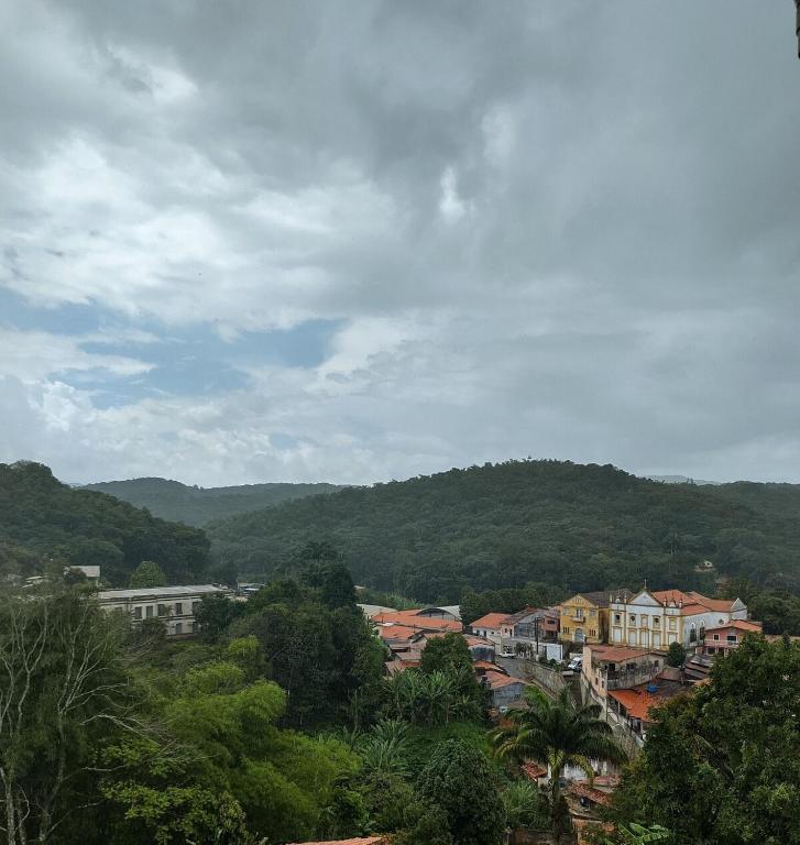 a view of a town with trees and buildings at APTLotus in Pacoti