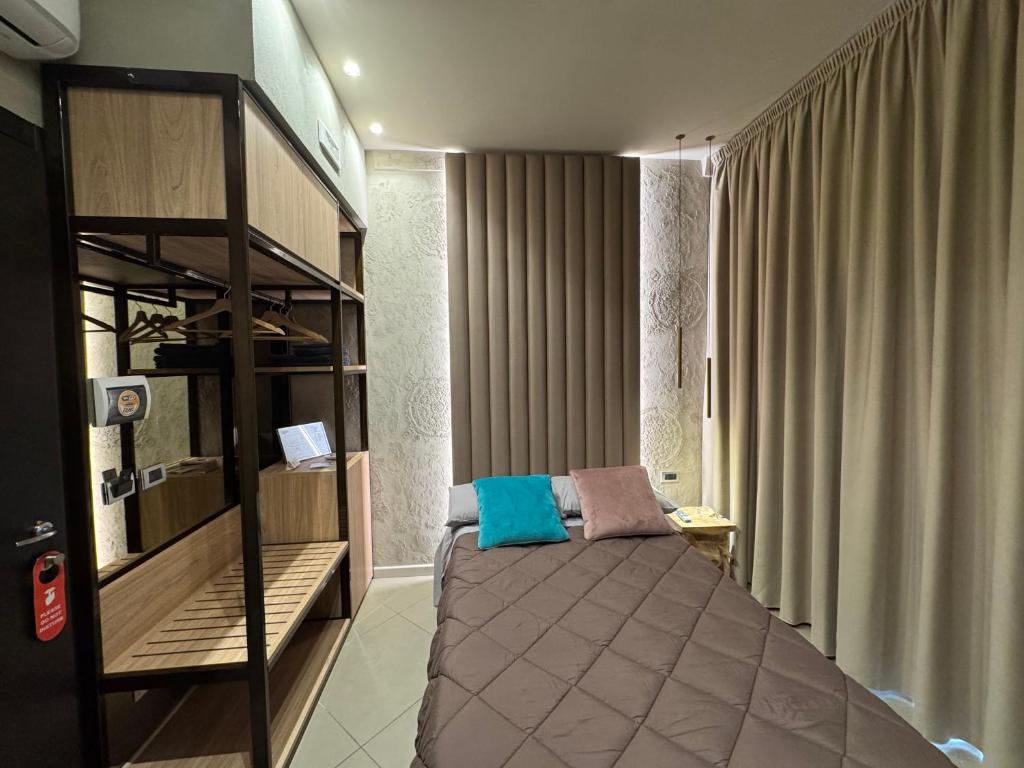 Posteľ alebo postele v izbe v ubytovaní Tropicana Room