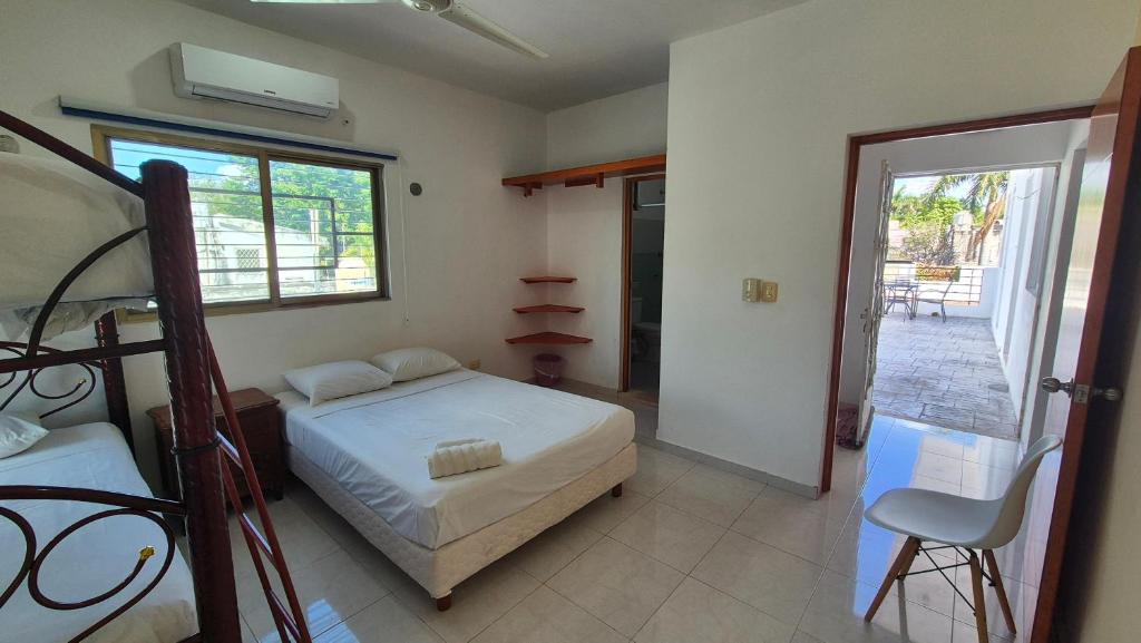 Postel nebo postele na pokoji v ubytování Hotel Monserrat