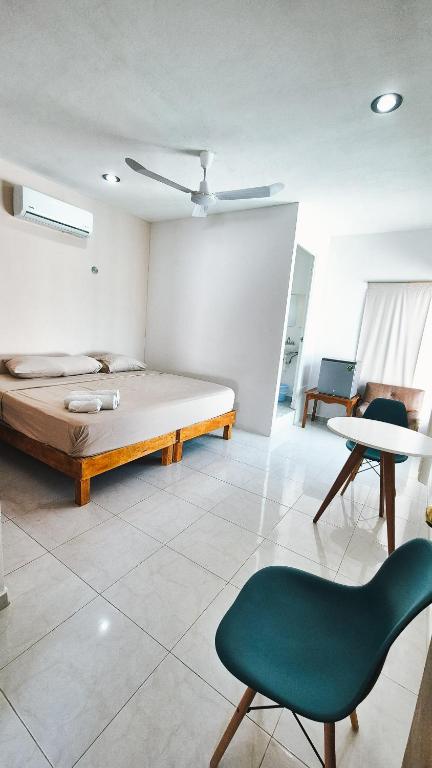 Postel nebo postele na pokoji v ubytování Hotel Monserrat