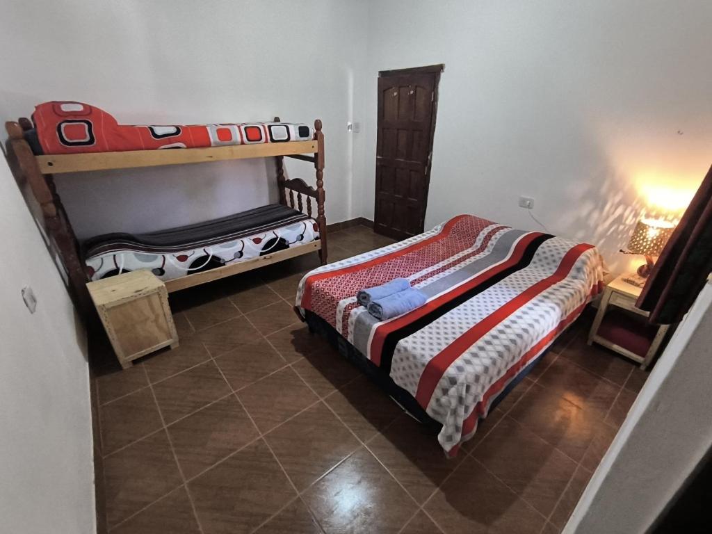 Postel nebo postele na pokoji v ubytování Hostel VERBENITA