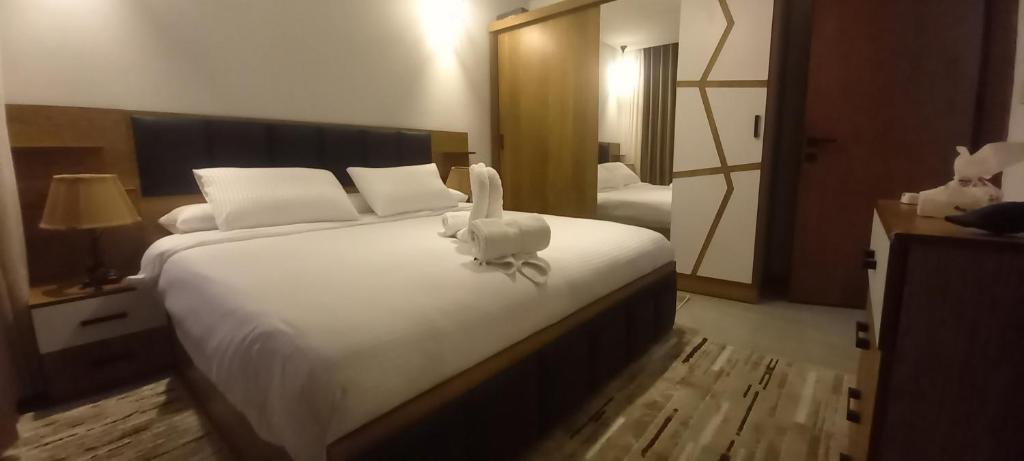 Postel nebo postele na pokoji v ubytování Mesca Chalet Soma Bay