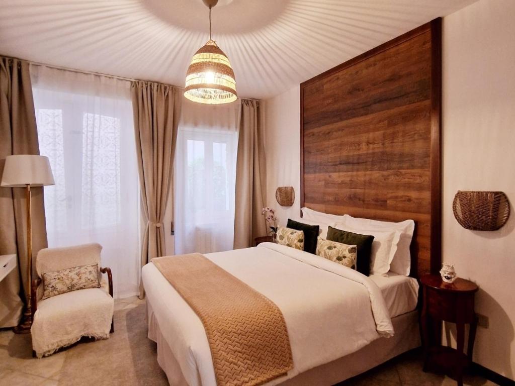 Giường trong phòng chung tại Donna Rosa - Your Home in Taormina